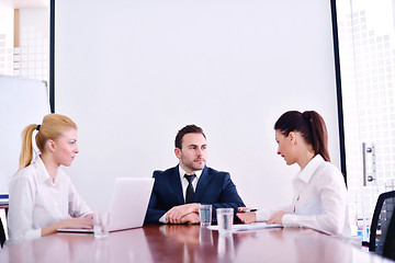 Image showing business people in a meeting at office