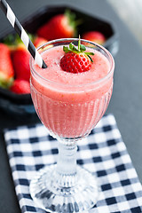 Image showing Fruit smoothie and strawberries