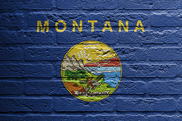 Image showing Brick wall with a painting of a flag, Montana