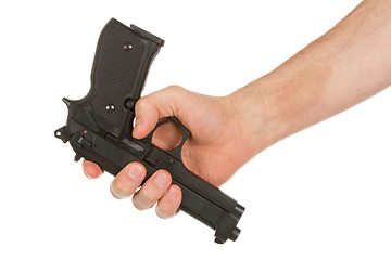 Image showing Disarming, hand giving a gun