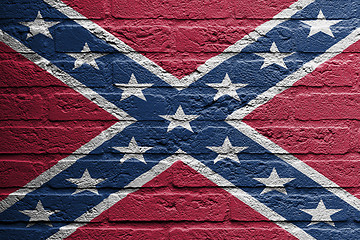 Image showing Brick wall with a painting of a flag, confederate flag