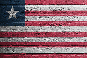 Image showing Brick wall with a painting of a flag, Liberia