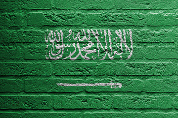 Image showing Brick wall with a painting of a flag, Saudi Arabia