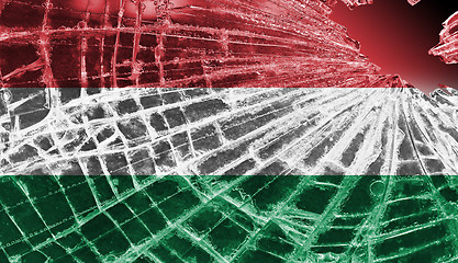 Image showing Broken glass or ice with a flag, Hungary