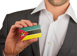 Image showing Businessman is holding a business card, Mozambique