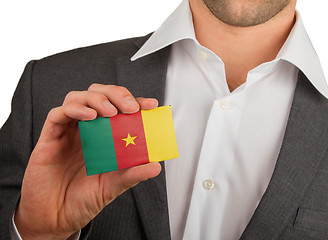 Image showing Businessman is holding a business card, Cameroon