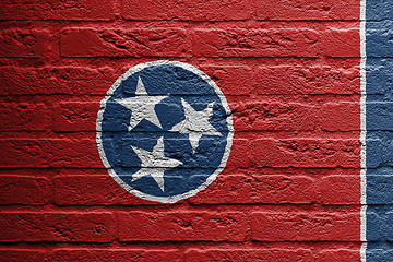 Image showing Brick wall with a painting of a flag, isolated, 