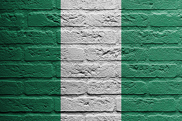 Image showing Brick wall with a painting of a flag, Nigeria