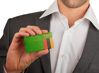 Image showing Businessman is holding a business card, Zambia