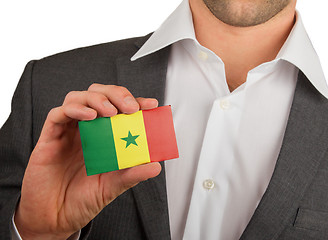 Image showing Businessman is holding a business card, Senegal