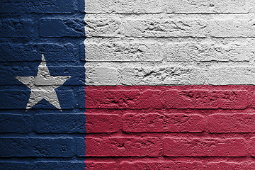 Image showing Brick wall with a painting of a flag, Texas