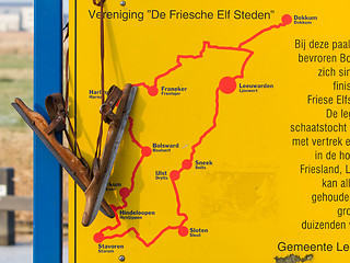 Image showing Old wooden ice skates hanging at the finish of the Dutch Elfsted