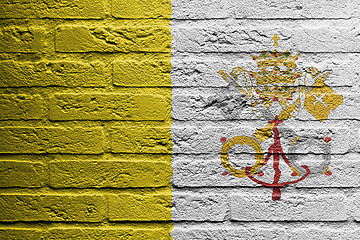 Image showing Brick wall with a painting of a flag, Vatican City