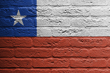 Image showing Brick wall with a painting of a flag, Chili