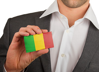 Image showing Businessman is holding a business card, Mali