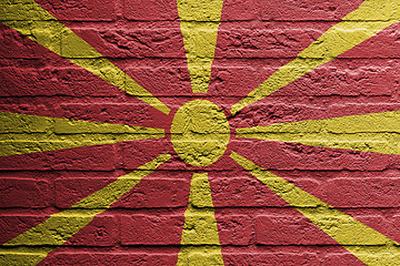 Image showing Brick wall with a painting of a flag, Macedonia