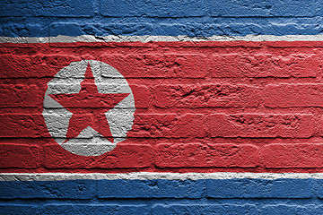 Image showing Brick wall with a painting of a flag, North Korea