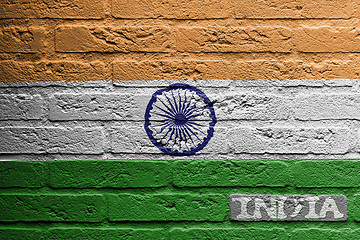 Image showing Brick wall with a painting of a flag, India