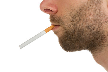 Image showing Side view of a man with a cigarette