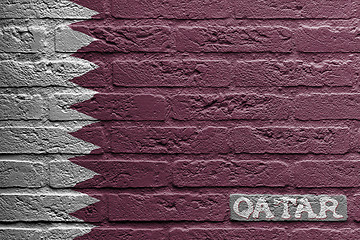 Image showing Brick wall with a painting of a flag, Qatar