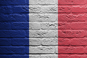 Image showing Brick wall with a painting of a flag, France