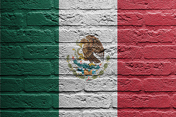 Image showing Brick wall with a painting of a flag, Mexico