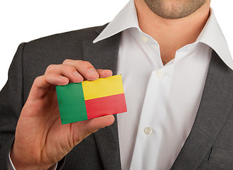 Image showing Businessman is holding a business card, Benin