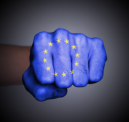 Image showing Fist punching, EU flag pattern