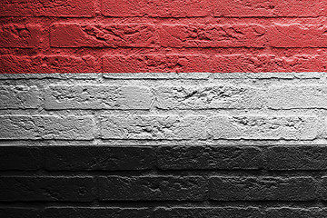 Image showing Brick wall with a painting of a flag, Yemen