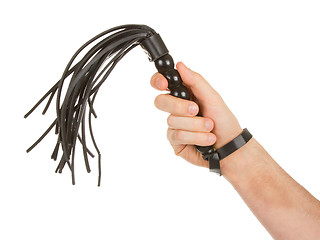 Image showing Strict Black Leather Flogging Whip in man's hand