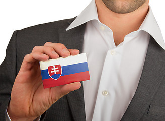 Image showing Businessman is holding a business card, Slovakia