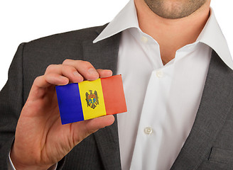 Image showing Businessman is holding a business card, Andorra