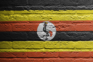 Image showing Brick wall with a painting of a flag, Uganda