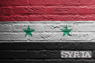 Image showing Brick wall with a painting of a flag, Syria