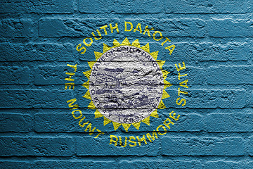 Image showing Brick wall with a painting of a flag, South Dakota