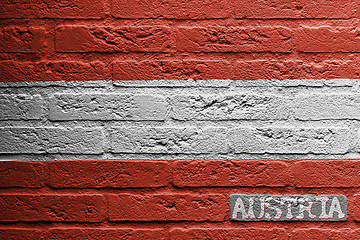 Image showing Brick wall with a painting of a flag, Austria