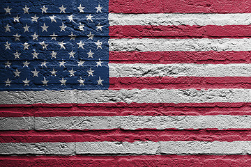 Image showing Brick wall with a painting of a flag, USA