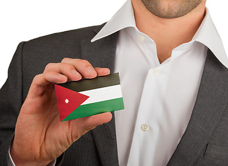 Image showing Businessman is holding a business card, Jordan