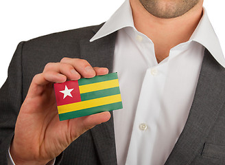 Image showing Businessman is holding a business card, Togo