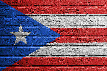 Image showing Brick wall with a painting of a flag, Puerto Rico