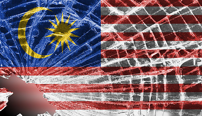 Image showing Broken glass or ice with a flag, Malaysia