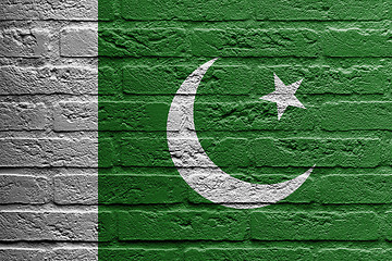 Image showing Brick wall with a painting of a flag, Pakistan