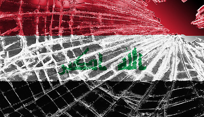 Image showing Broken glass or ice with a flag, Iraq