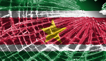 Image showing Broken glass or ice with a flag, Suriname