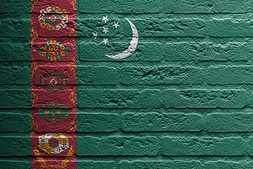 Image showing Brick wall with a painting of a flag, Turkmenistan