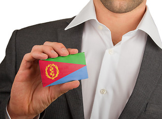 Image showing Businessman is holding a business card, Eritrea