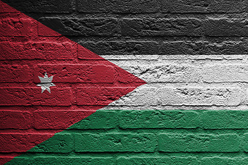 Image showing Brick wall with a painting of a flag, Jordan