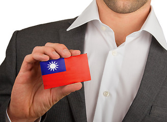 Image showing Businessman is holding a business card, Republic of China