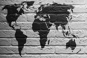 Image showing Brick wall with a painting of a flag, World Map