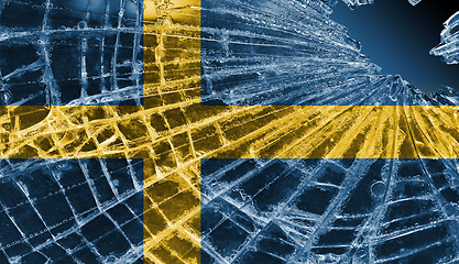 Image showing Broken glass or ice with a flag, Sweden